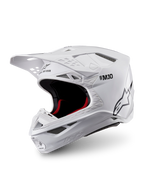 Alpinestars Supertech M10 Solid Helm ECE 22.06, glänzender weißer Motocross-Helm mit schwarzer und roter Innenpolsterung, Helmschirm und mehreren Belüftungsöffnungen, Dreiviertelansicht