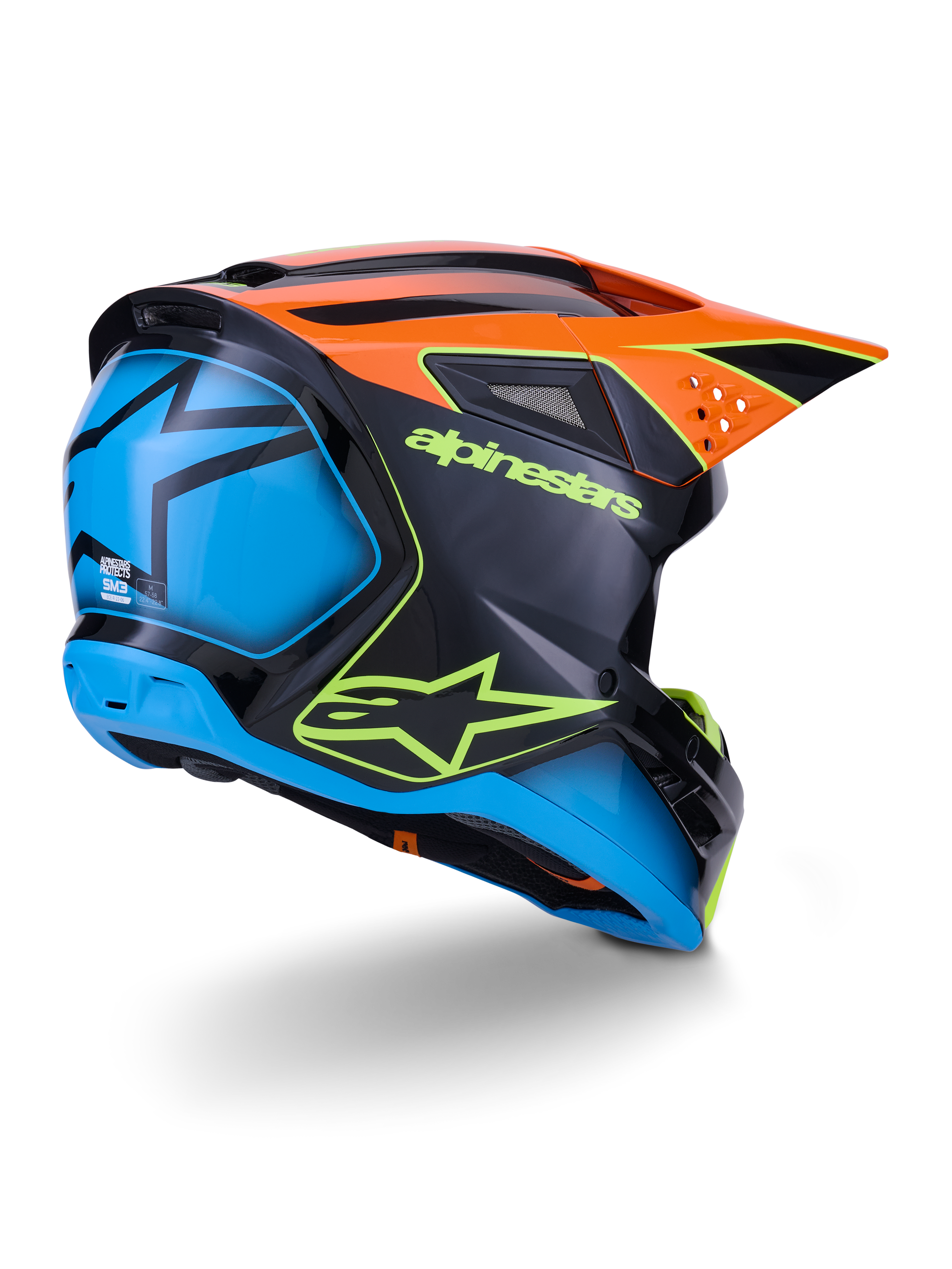 Alpinestars S-M3 Fray Helm ECE 22.06, Motocross-Helm, Schwarz mit orangen und blauen Paneelen, neongelbes Alpinestars-Logo, große blaue Rückseite mit Stern-Grafik, oranges Visier mit integrierten Belüftungsöffnungen, professionelle Offroad-Schutzausrüstung