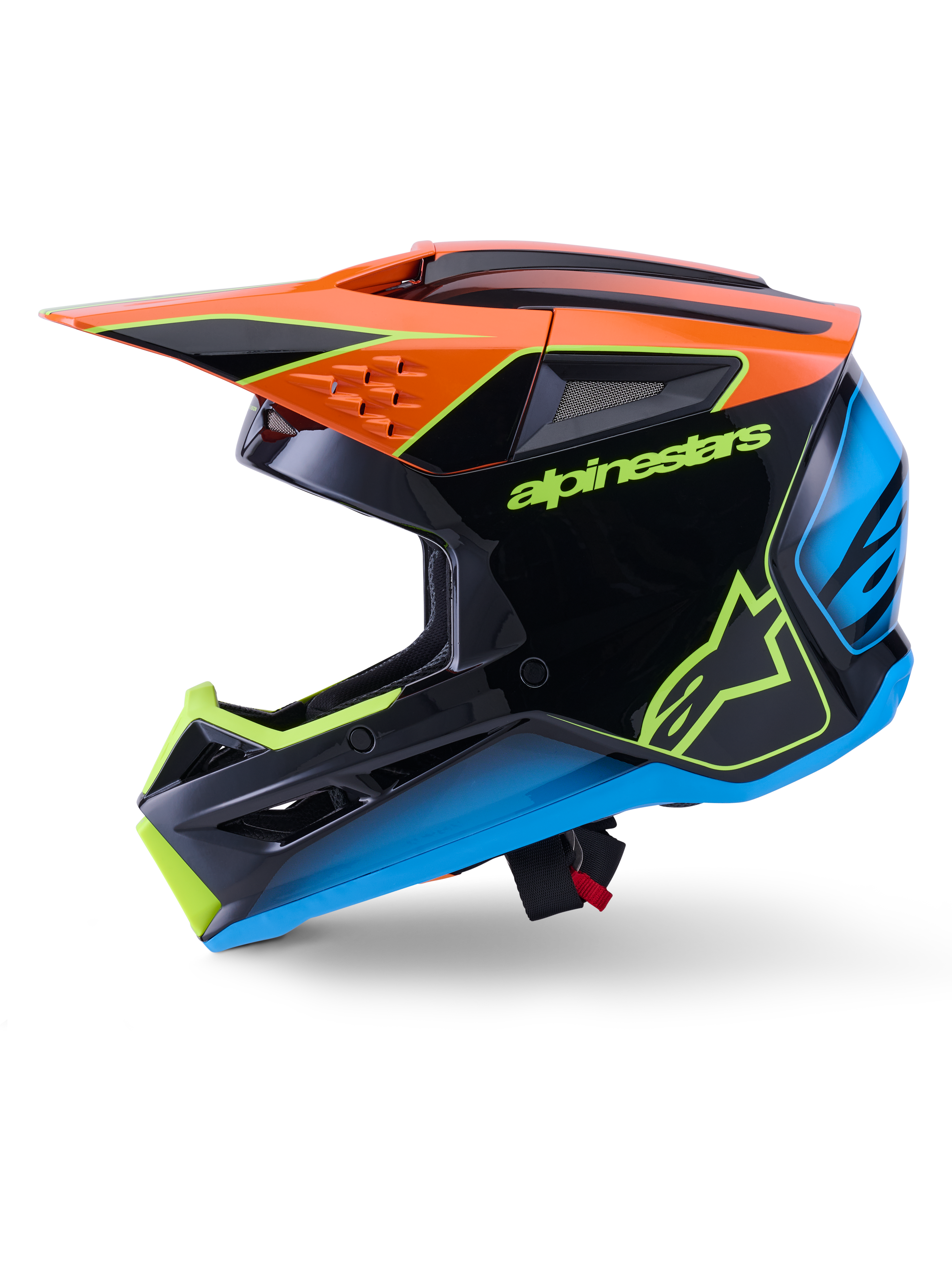 Alpinestars S-M3 Fray Helm ECE 22.06, Motocross-Helm, Schwarz mit orangefarbenen, blauen und neongelben Akzenten, Seitenprofil mit aerodynamischer Schale und integrierten Belüftungsöffnungen, markantes Alpinestars-Branding, professioneller Offroad-Rennschutz