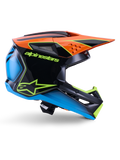 Alpinestars S-M3 Fray Helm ECE 22.06, Motocross-Helm, Schwarz, Orange, Blau und Neongelb, Seitenprofil einer glänzenden aerodynamischen Schale mit markantem orangem Helmschild, neongrünem Branding und blauen Akzenten, Offroad-Rennschutz