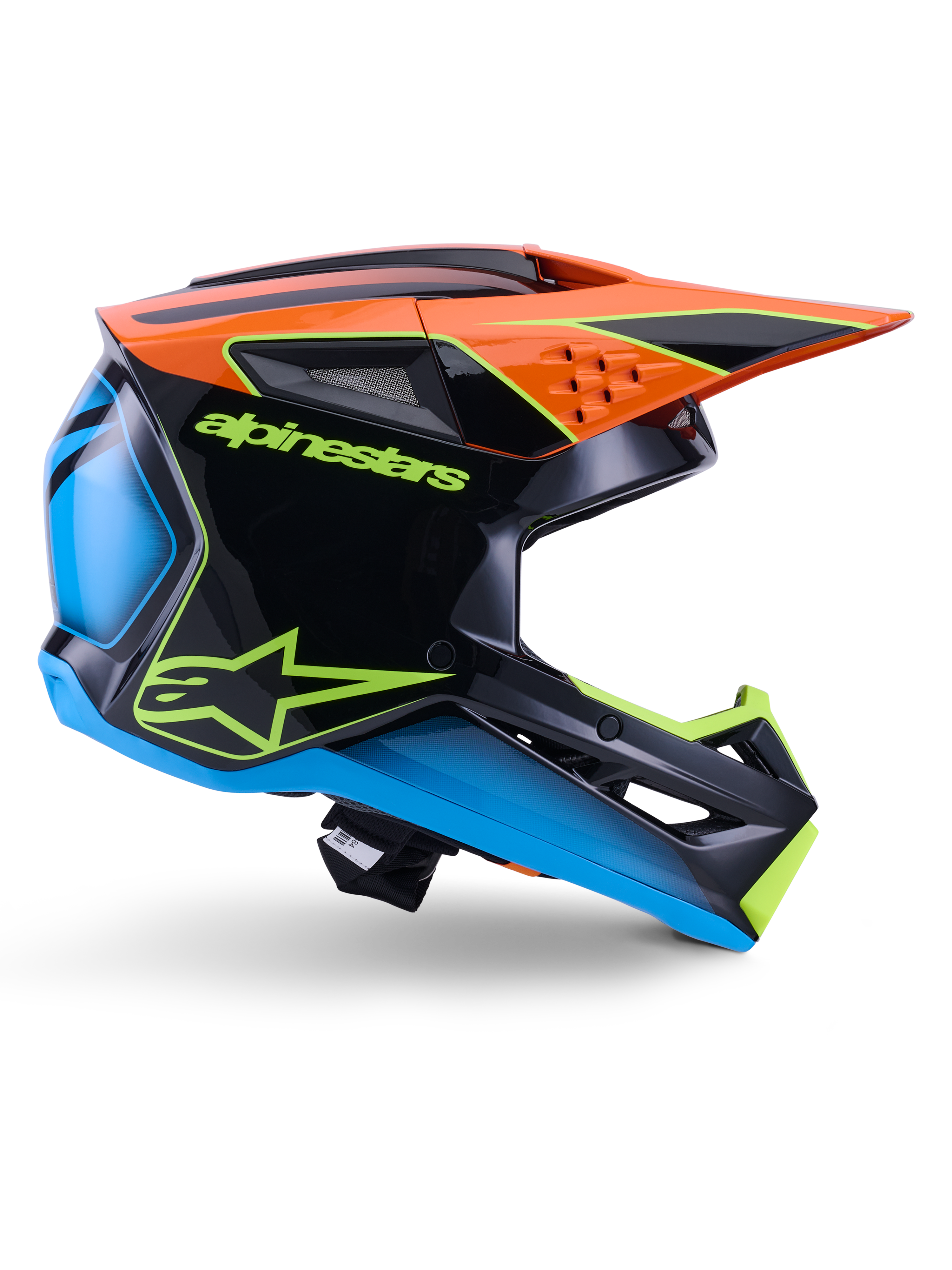 Alpinestars S-M3 Fray Helm ECE 22.06, Motocross-Helm, Schwarz, Orange, Blau und Neongelb, Seitenprofil einer glänzenden aerodynamischen Schale mit markantem orangem Helmschild, neongrünem Branding und blauen Akzenten, Offroad-Rennschutz