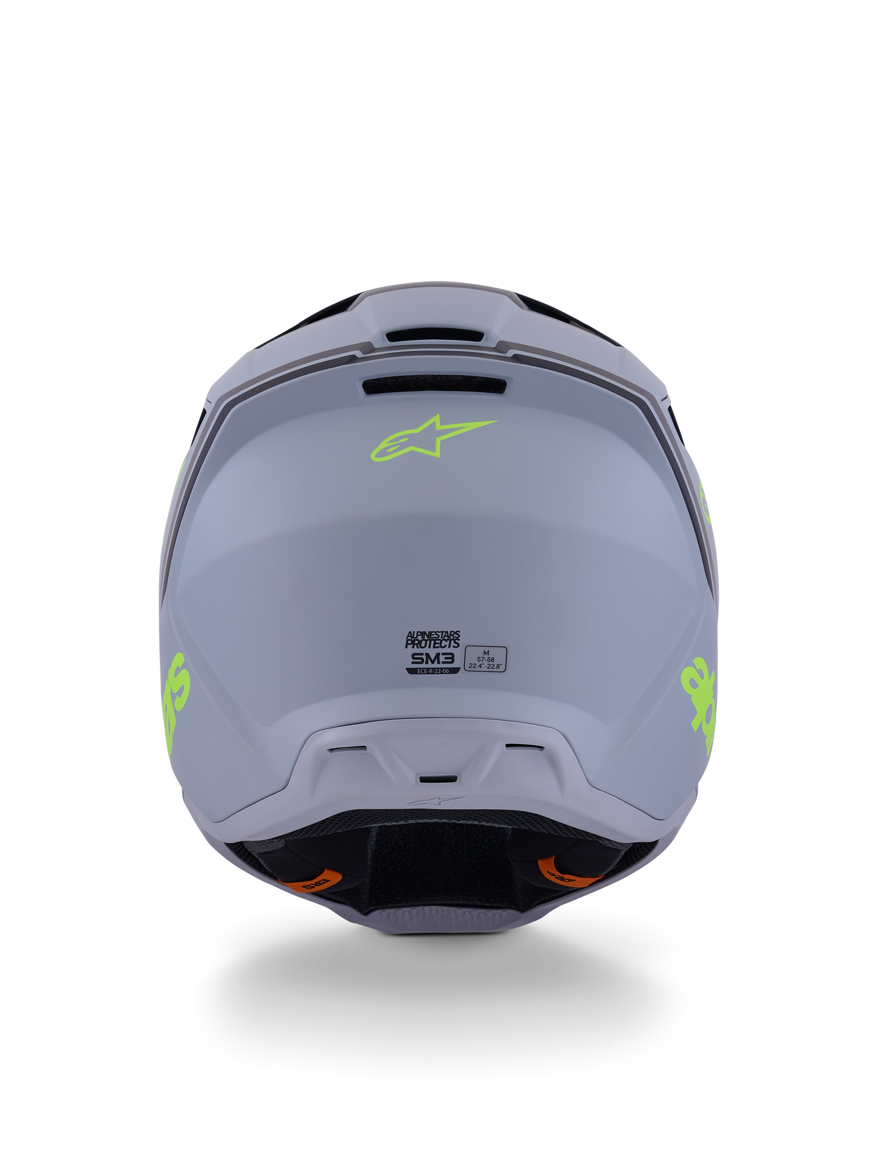 Alpinestars S-M3 Radium Helm, Motocross-Helm, Grün, Schwarz und Gelb Fluo Matt, Rückansicht mit matter Schalenoberfläche, neongelbem Alpinestars-Logo und ECE 22.06-Zertifizierungsdetails.