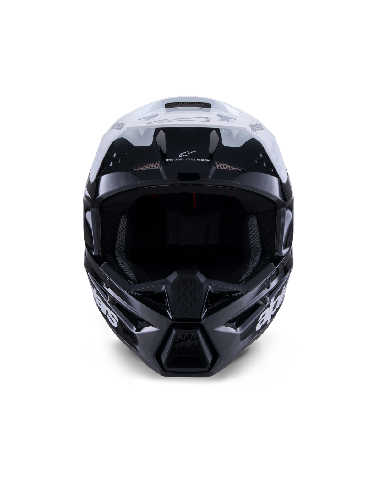 Alpinestars S-M3 Radium Helm, Motocross-Helm, Schwarz, Weiß und Grau glänzend, Vorderansicht, mit einem aggressiven Schalendesign, weißem Visier, schwarzem Kinnschutz und netzgefütterten Belüftungsöffnungen.
