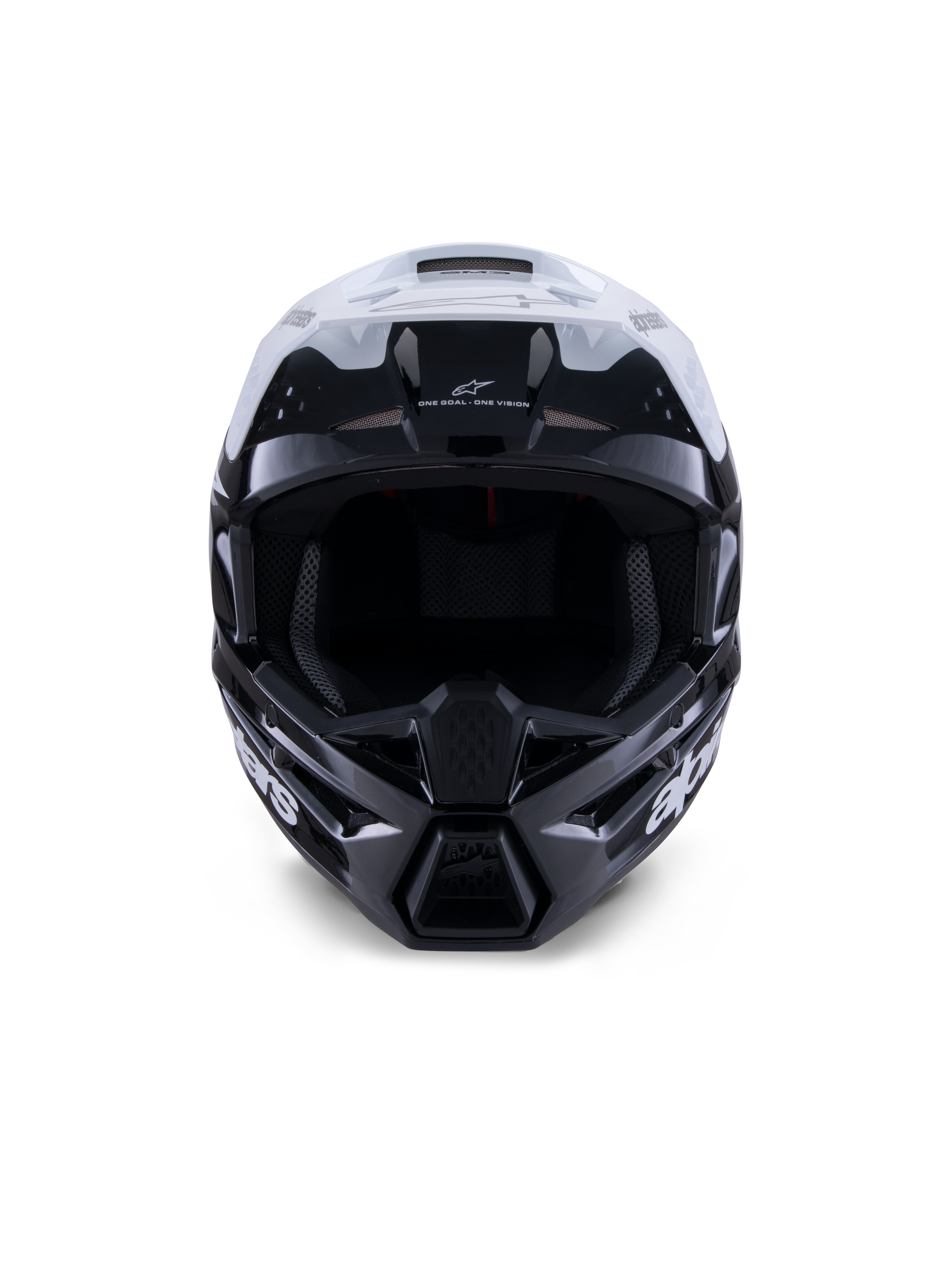 Alpinestars S-M3 Radium Helm, Motocross-Helm, Schwarz, Weiß und Grau glänzend, Vorderansicht, mit einem aggressiven Schalendesign, weißem Visier, schwarzem Kinnschutz und netzgefütterten Belüftungsöffnungen.