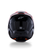 Alpinestars S-M3 Radium Helm ECE 22.06, Motocross-Helm, Schwarz Glänzend mit Akzenten in Rot Fluo und Weiß, Rückansicht mit aerodynamischem Schalendesign, weißem Stern-Logo und Zertifizierungsaufklebern.