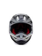 Alpinestars Supertech M10 Flood ECE 22.06 Helmet, Motocross Helmet, Silver Black and Orange Fluo, front view featuring an aerodynamic shell, wide eye port with red interior padding, black Alpinestars logo, and ventilated chin bar for off-road racing