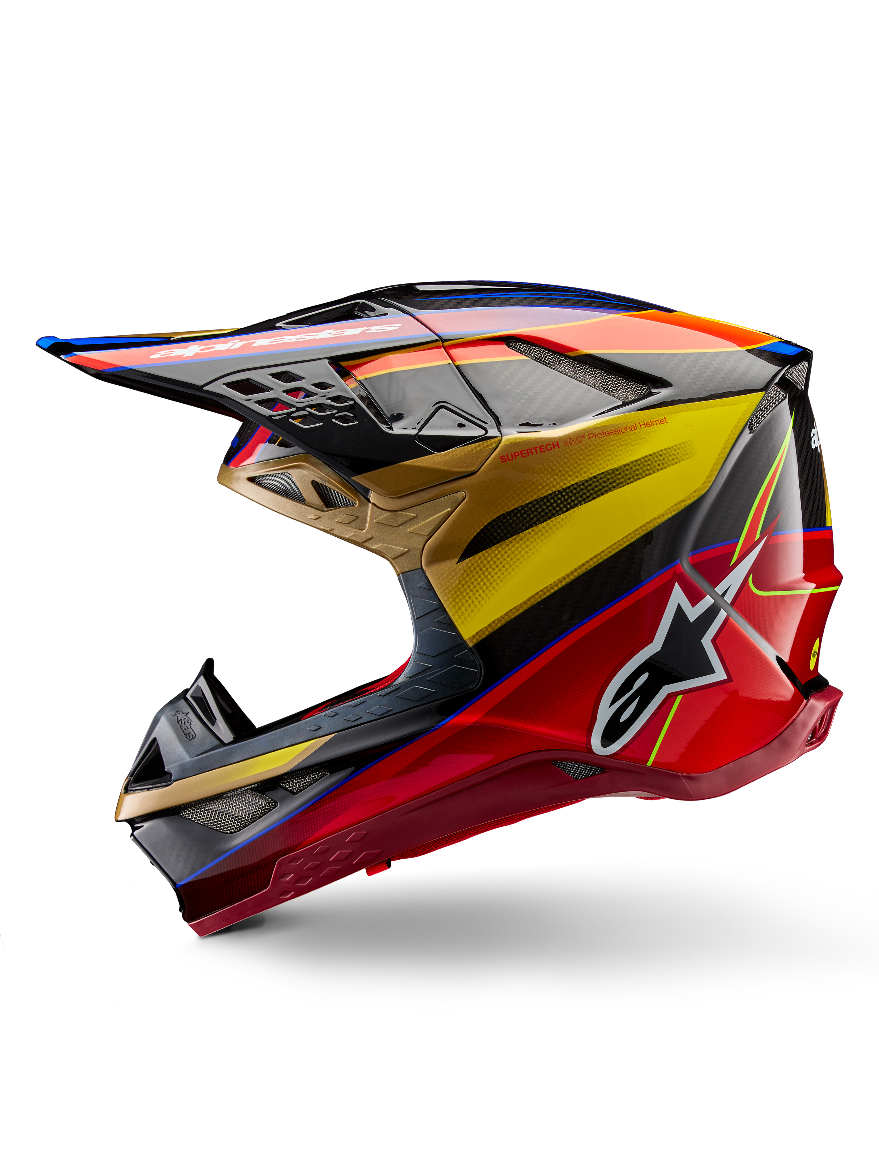 Alpinestars Supertech M10 Era Helmet, Motocross Helmet, Gold Yellow Rio Red Glossy, side profile featuring carbon fiber texture and bold graphics, Alpinestars star logo, aerodynamic shape with multiple ventilation ports, professional off-road racing protection