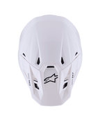 Alpinestars S-M7 Solid Helm, Motocross-Helm, Weiß glänzend, Ansicht von oben zeigt schlanke aerodynamische Schale, schwarze Belüftungsöffnungen, schwarzes Astar-Logo und M7-Branding auf dem Visier, Hochleistungs-Offroad-Rennausrüstung