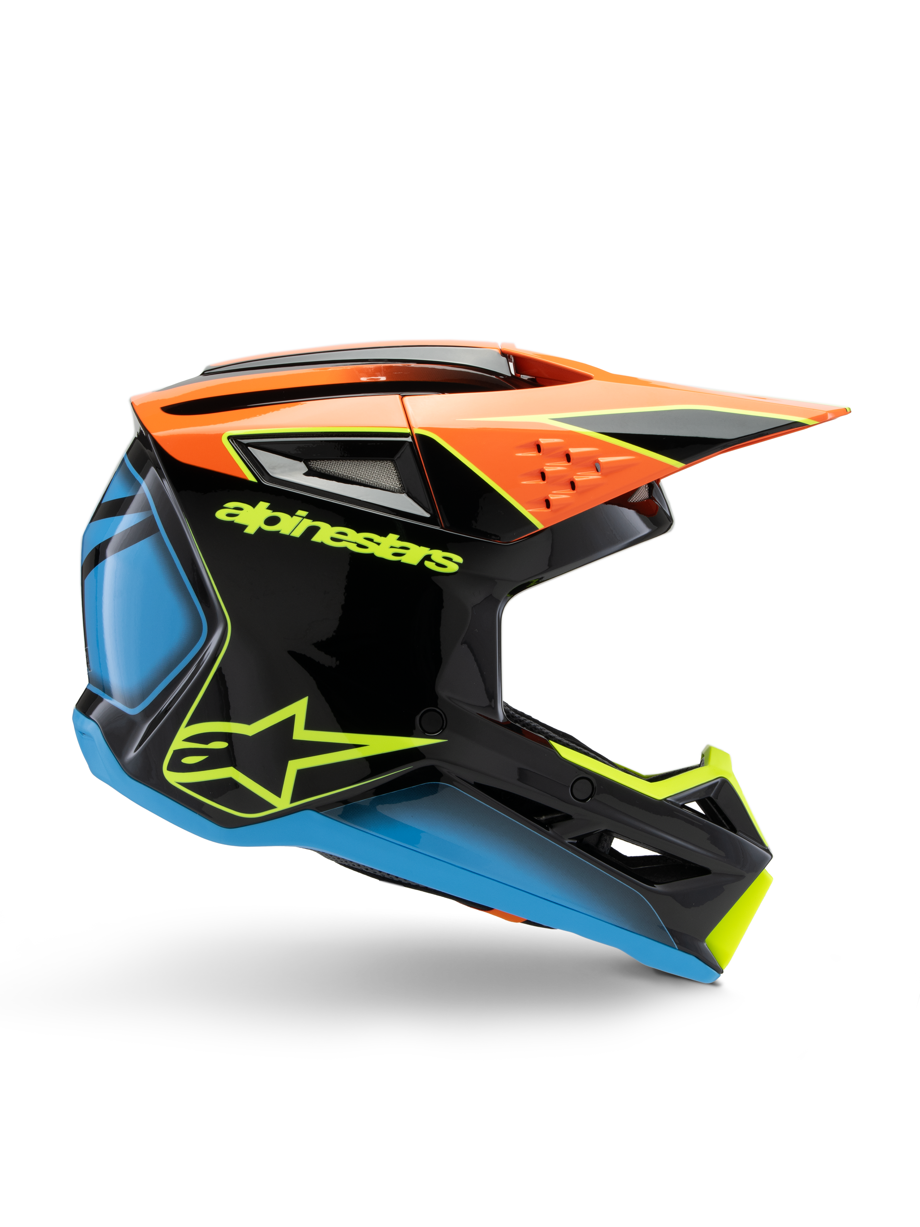 Alpinestars S-M3 Youth Fray Helm, Motocross-Helm, Schwarz mit orangefarbenen, blauen und neongelben Akzenten, Seitenprofilansicht zeigt aerodynamisches Design, Belüftungsöffnungen und markantes Visier, glänzendes Finish mit auffälligem gelbem Branding.