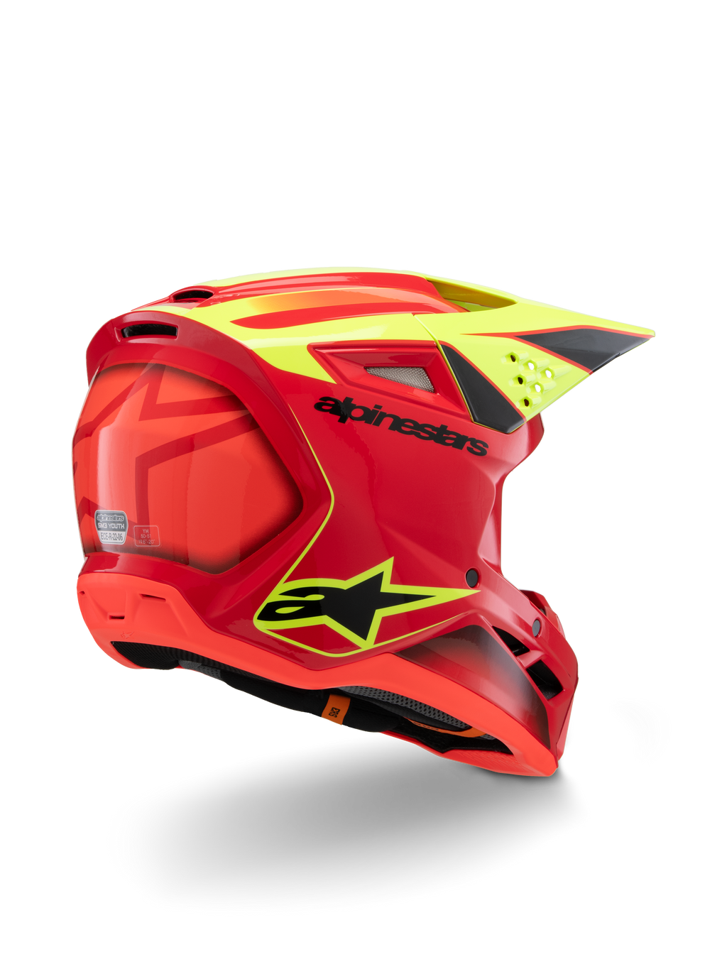 Alpinestars S-M3 Jugend-Fray Helm, Rot und Gelb Fluo Glänzend, Dreiviertel-Rückansicht, mit markanten schwarzen Logos und aerodynamischen Belüftungsöffnungen, gut sichtbarer Jugend-Motocross-Helm