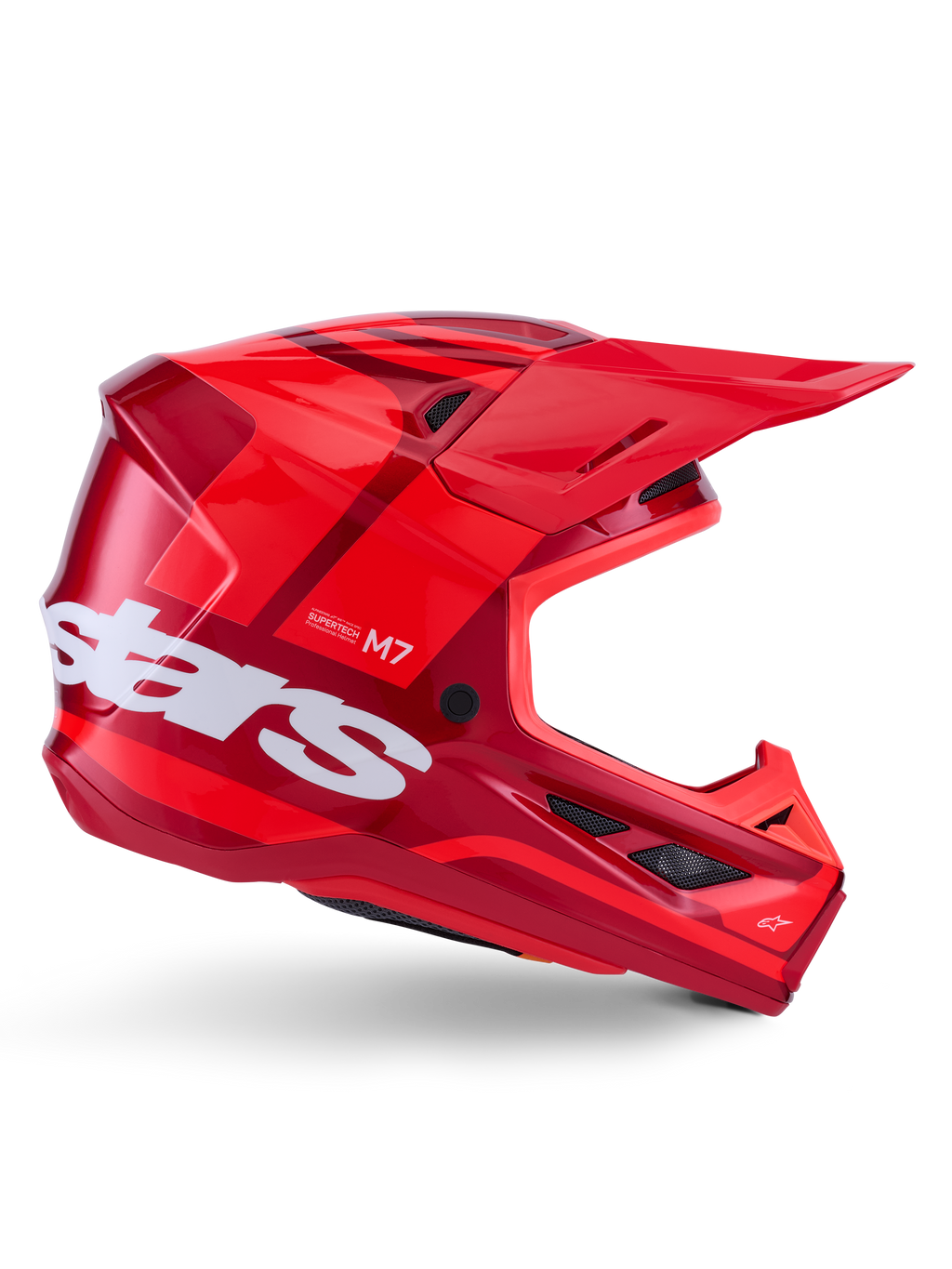 Alpinestars S-M7 Core Helm, Motocross-Helm, Rot glänzend mit dunkelroten Akzenten und weißem Branding, Seitenansicht mit großem weißem Stars-Logo, aerodynamische Schale mit Mesh-Belüftungsöffnungen und einem markanten Visier