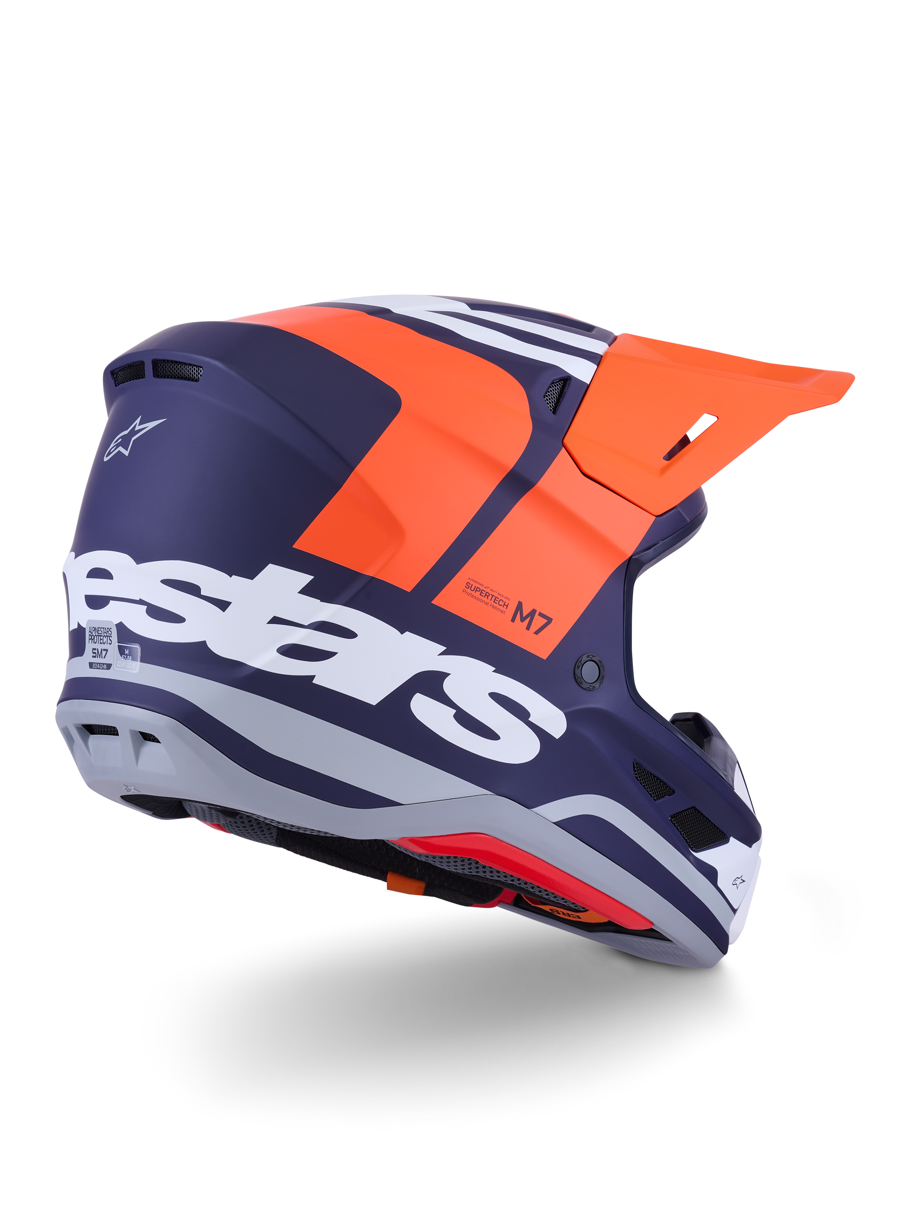 Alpinestars S-M7 Core Helm, Motocross-Helm, Orange und Blau Matt, Rückansicht mit markantem weißem Alpinestars-Branding auf der Rückseite, leuchtend oranges Visier, aerodynamische Verbundschale mit grauen Akzenten, professioneller Schutz für Offroad-Rennsport