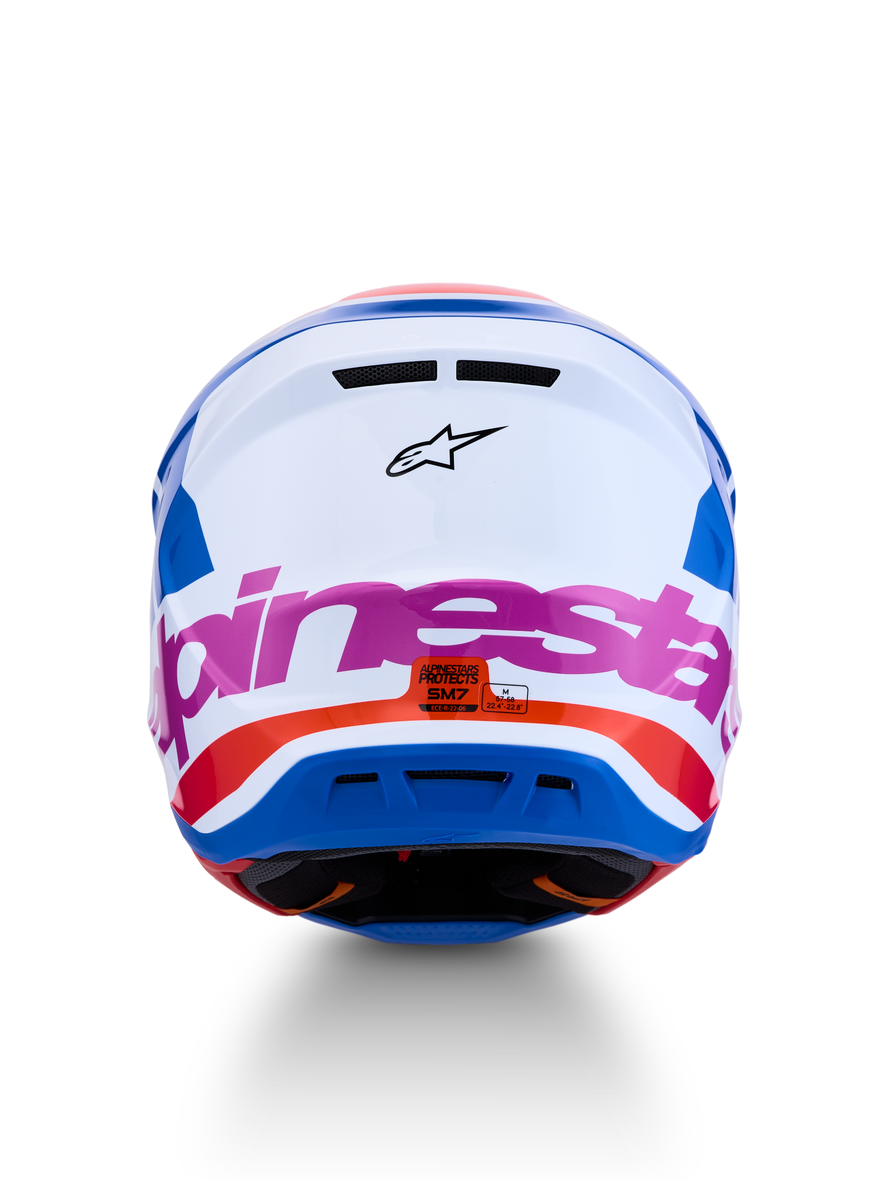 Alpinestars S-M7 Core Helm ECE06, Motocross-Helm in Weiß und Blau mit pinken und orangefarbenen Akzenten, Rückansicht, ECE 22.06-zertifiziert