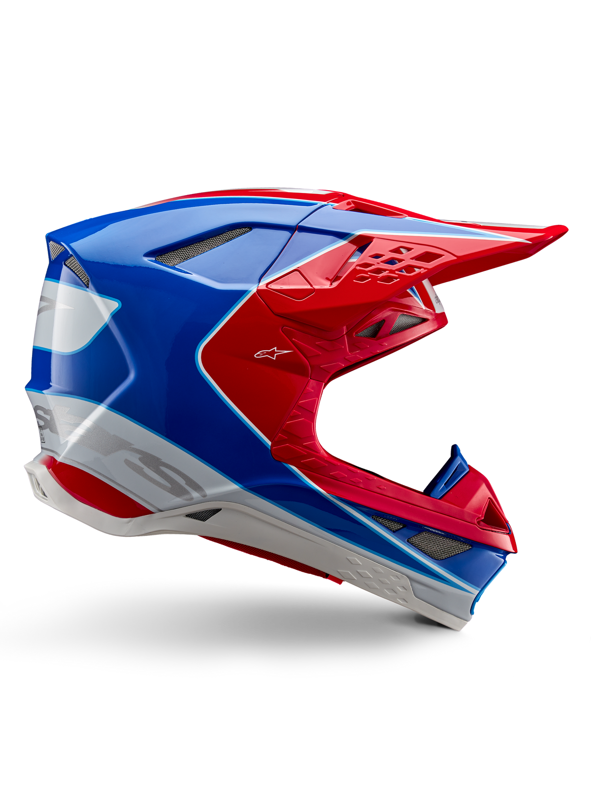Alpinestars Supertech M10 Aeon Helm, Motocross-Rennhelm, Hellrot, Blau und Weiß, glänzende Oberfläche, aerodynamisches Seitenprofil mit mehreren netzabgedeckten Belüftungsöffnungen, markanten Konturen und Helmschild