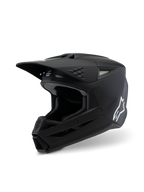 Alpinestars S-M3 Youth Solid Helm ECE 22.06, Motocross-Helm, Mattschwarz, Seitenansicht mit weißem Alpinestars-Logo, aerodynamische Schale mit Belüftungsöffnungen und integriertem Visier, professioneller Offroad-Kopfschutz für junge Fahrer