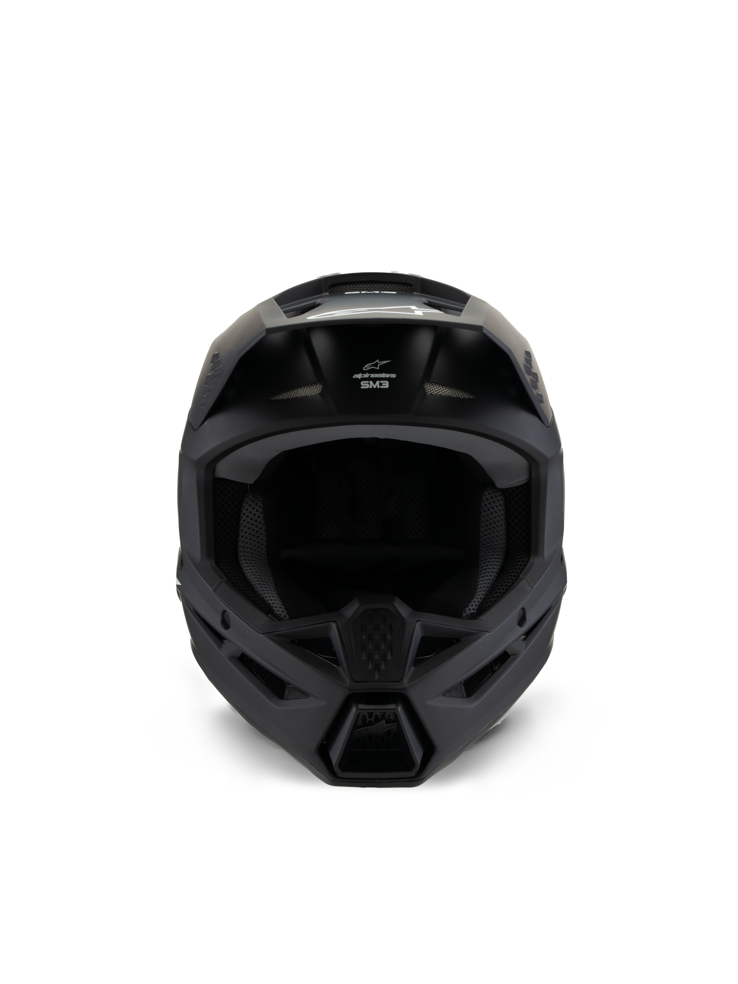 Alpinestars S-M3 Youth Solid Helm, Motocross-Helm, Schwarz Matt, Vorderansicht, mit mattem Finish, Belüftungsöffnungen am Kinnbügel und an der Stirn, weißes SM3-Logo, schlankes aerodynamisches Design für den Offroad-Rennsport