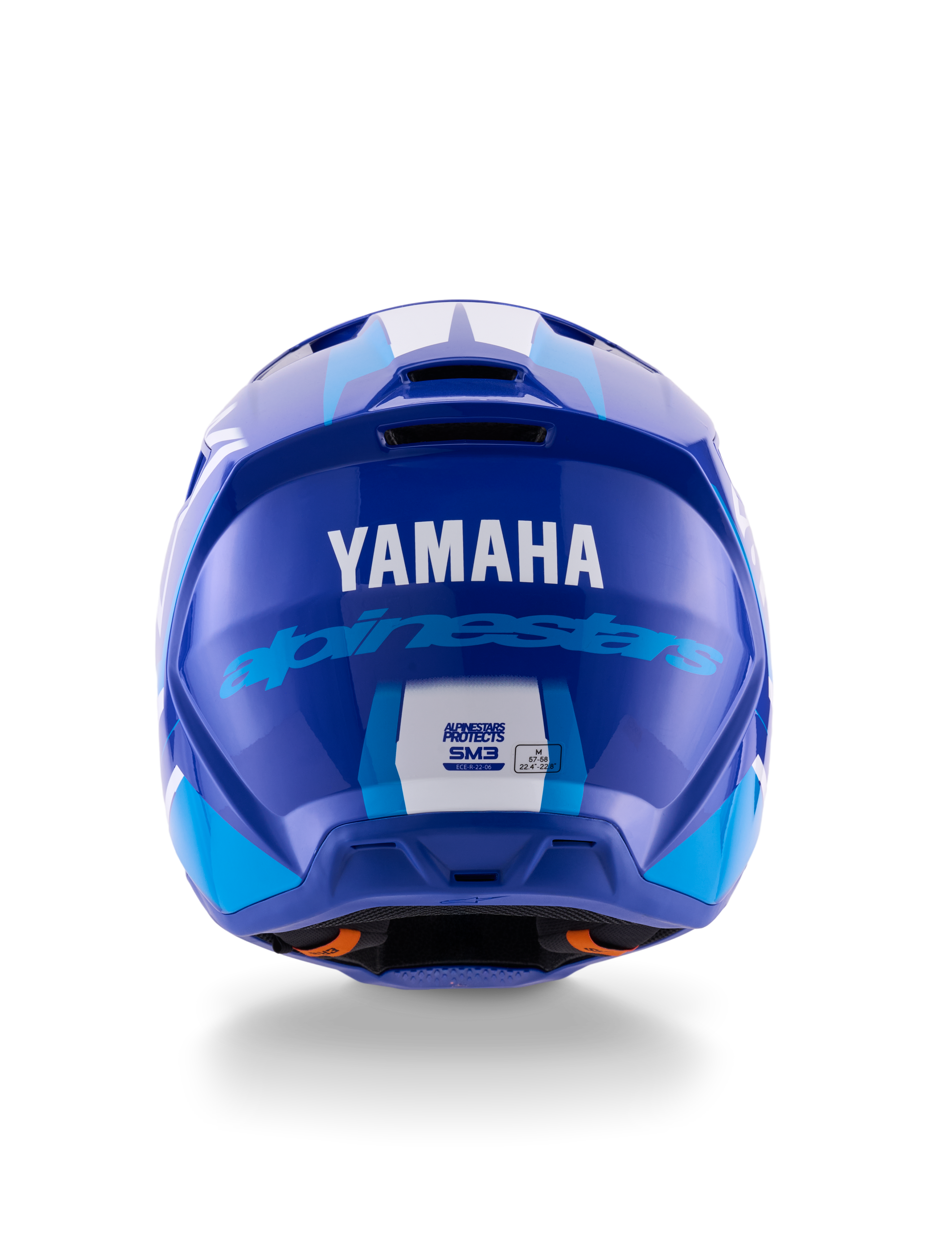 Alpinestars Yamaha S-M3 Helm, Motocross-Helm, Blau Weiß Glänzend, Rückansicht mit weißem YAMAHA-Logo und blauem Alpinestars-Schriftzug, elegantes glänzendes Finish mit sichtbaren Belüftungsöffnungen und Sicherheitszertifizierungen.