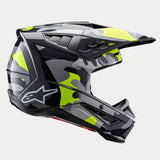 Alpinestars S-M5 Rover 2 Helm, Motocross-Helm, Dunkelgrau und Gelb Fluo Glänzend, mit Camouflage-Grafikmuster, Seitenprofil-Ansicht mit weißem Astars-Logo und fortschrittlichen Belüftungsöffnungen
