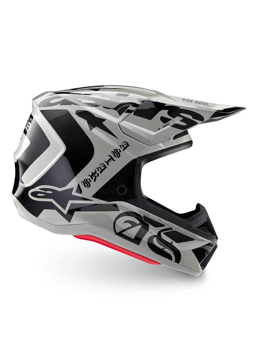 Alpinestars Limited Edition S-M7 Wolf Dust Helm, Motocross-Helm in Dune Black Glossy, Seitenprofil mit markanten schwarzen Grafiken und Branding, roten Akzenten an der Unterseite, aerodynamischer Offroad-Kopfschutz