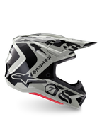 Alpinestars Limited Edition S-M7 Wolf Dust Helm, Motocross-Helm in Dune Black Glossy, Seitenprofil mit markanten schwarzen Grafiken und Branding, roten Akzenten an der Unterseite, aerodynamischer Offroad-Kopfschutz