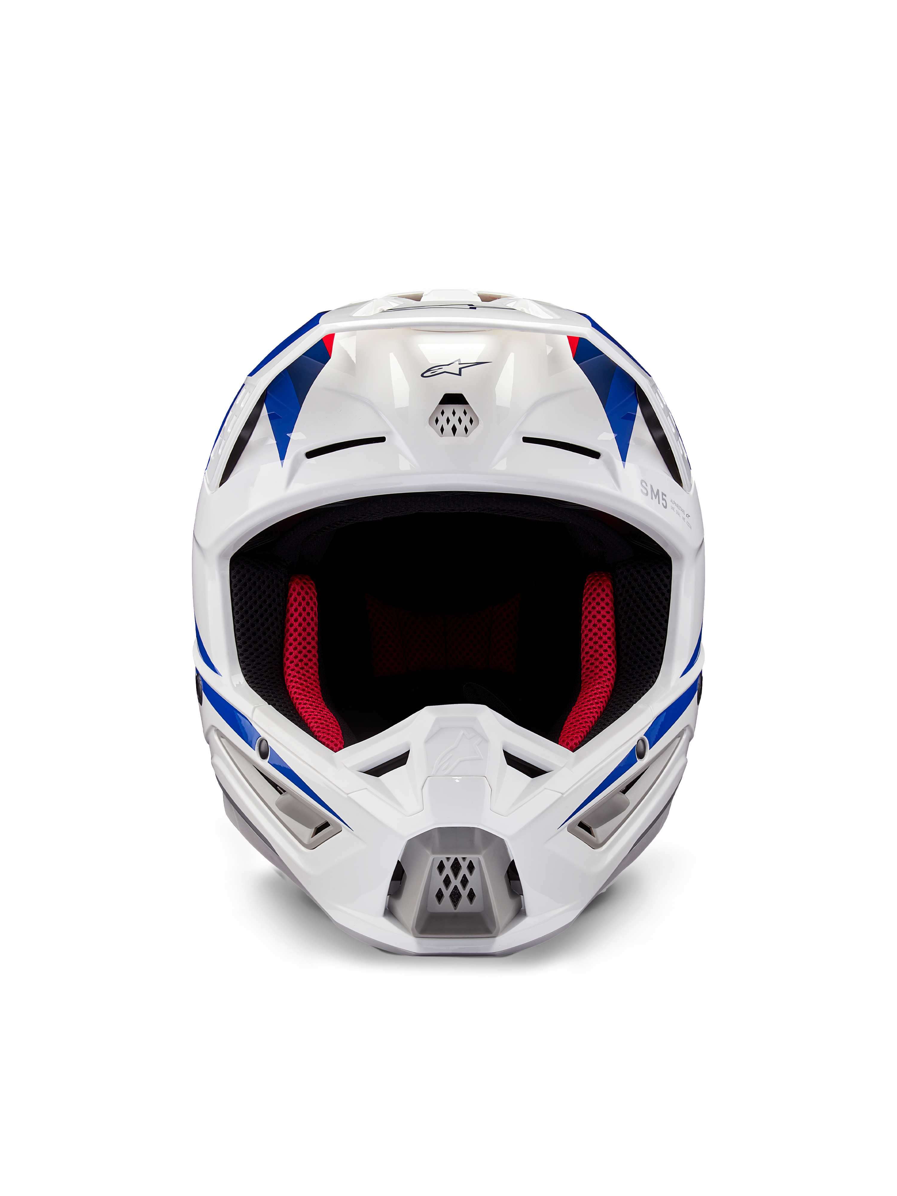 Alpinestars Honda S-M5 Helm ECE, Motocross-Helm, Weiß, Blau und Rot glänzend, Frontansicht mit Belüftungsöffnungen und roter Innenpolsterung, aerodynamisches Design für Schutz im Offroad-Rennsport