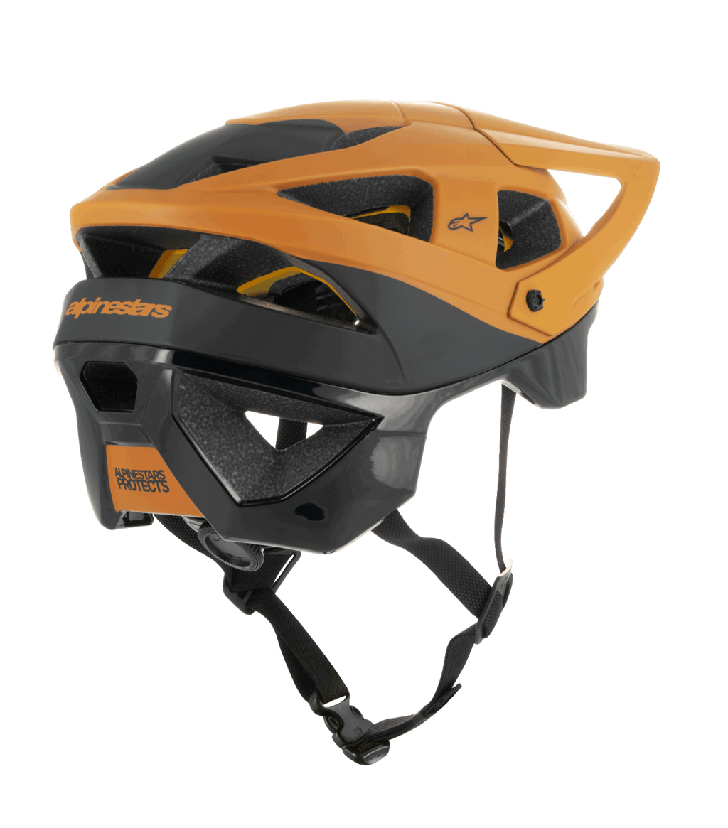 Alpinestars Vector Tech Zeal Helmet, MTB Helmet, Black and Dark Gold, rear-side view showing multiple ventilation ports, adjustable visor, and secure black chin strap, protective mountain bike gear with Alpinestars branding