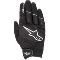 Alpinestars Atom Gloves, lightweight motorcycle riding gloves, Black and White, featuring a large white star logo on the backhand, mesh panels for ventilation, padded knuckles, and a secure hook-and-loop wrist closure