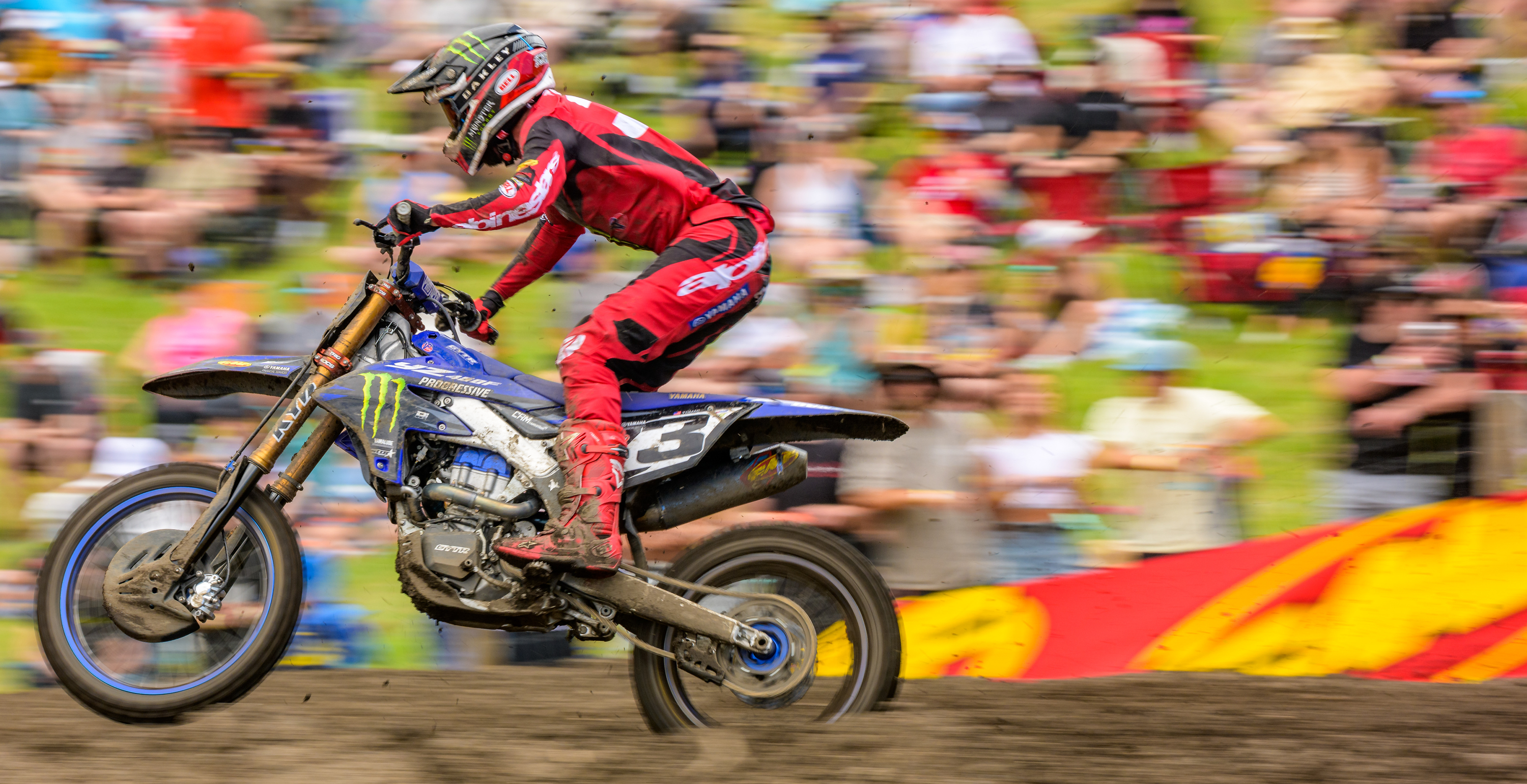 Eli Tomac racing through the frame