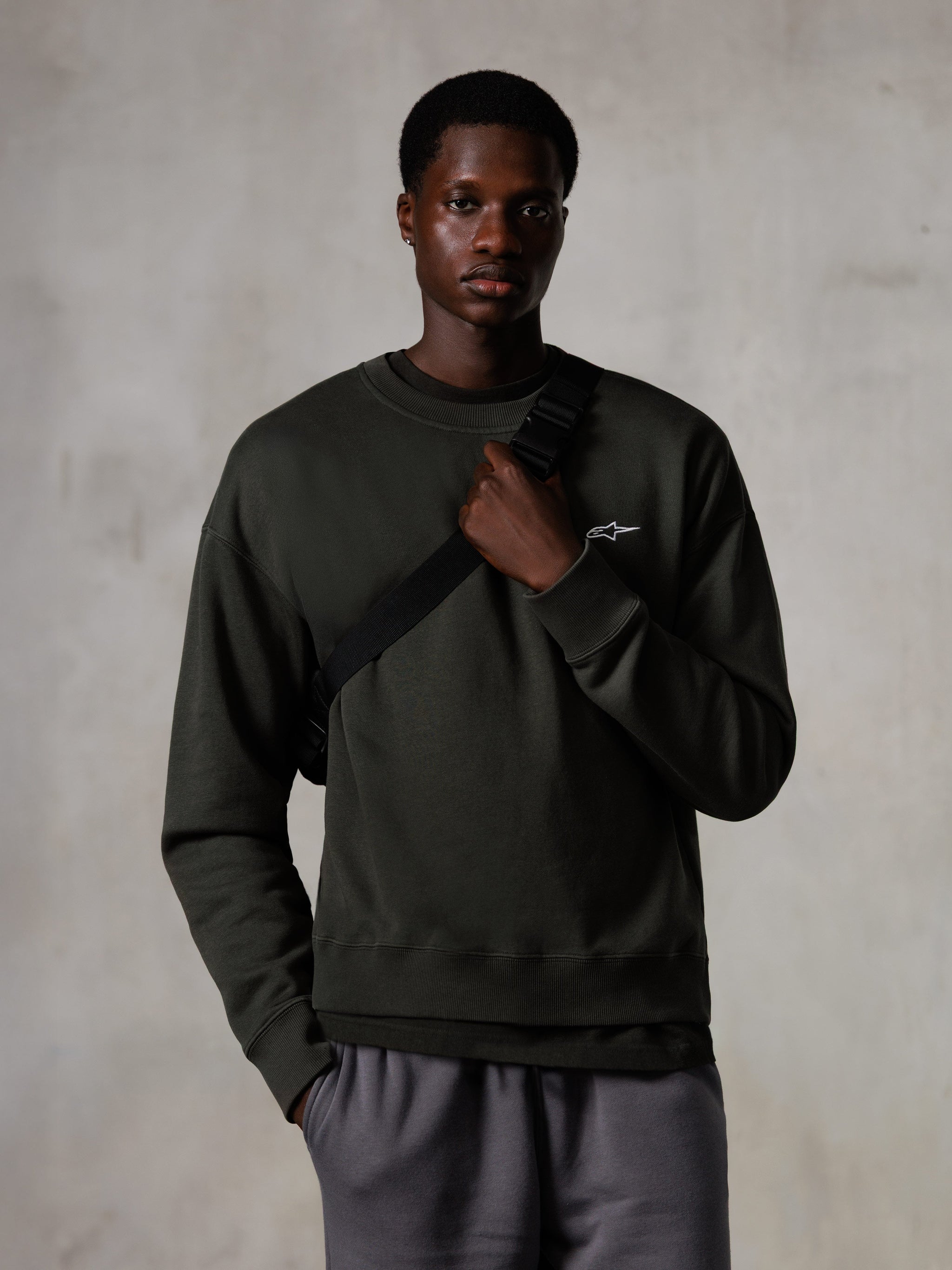 Alpinestars Essentials Ageless Crew, crewneck sweatshirt, Off Black, featuring a small white Alpinestars logo on the chest, ribbed collar and hem, casual lifestyle streetwear