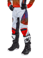 Alpinestars 2024 Youth Racer Hoen Pants, Motocross Pants, Light Gray with Hot Orange and Black accents, featuring red star logos on thighs and red knee panels, worn with black and white boots, durable design for off-road racing
